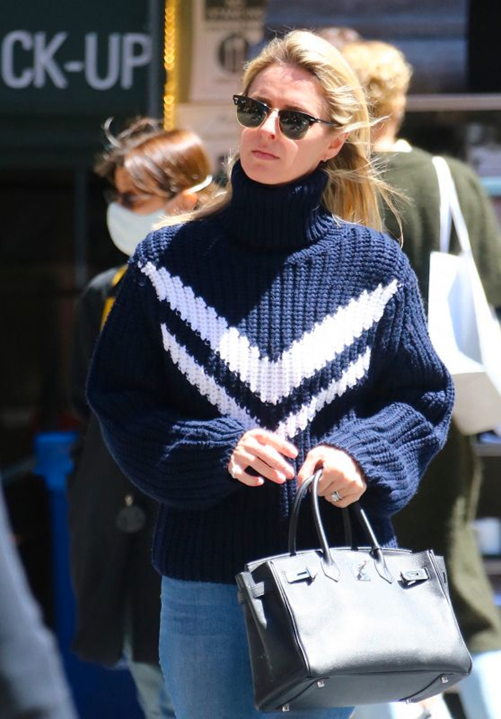 Nicky Hilton with canvas Goyard cross body bag in New York on January 21 ~  I want her style - What celebrities wore and where to buy it. Celebrity  Style
